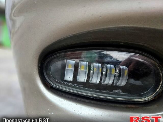 Бежевый Дэу Ланос, объемом двигателя 1.5 л и пробегом 220 тыс. км за 2750 $, фото 5 на Automoto.ua