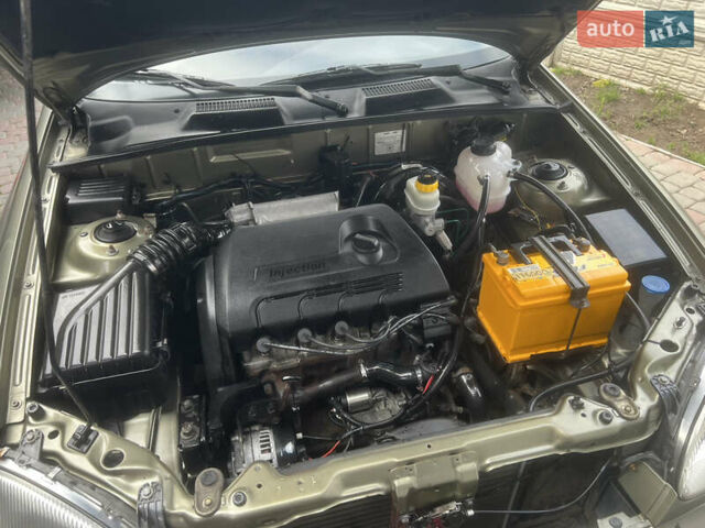 Бежевый Дэу Ланос, объемом двигателя 1.4 л и пробегом 180 тыс. км за 2099 $, фото 7 на Automoto.ua