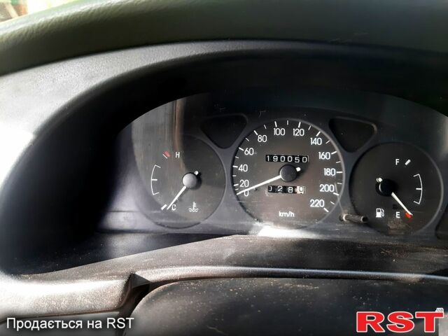 Бежевий Деу Ланос, об'ємом двигуна 1.4 л та пробігом 190 тис. км за 2600 $, фото 1 на Automoto.ua