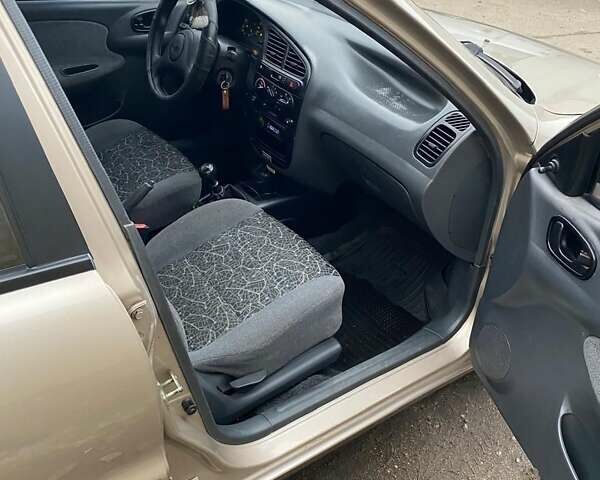 Бежевий Деу Ланос, об'ємом двигуна 1.5 л та пробігом 268 тис. км за 2500 $, фото 11 на Automoto.ua