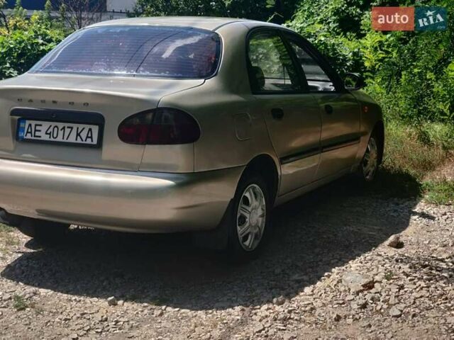 Бежевый Дэу Ланос, объемом двигателя 1.5 л и пробегом 199 тыс. км за 2400 $, фото 2 на Automoto.ua