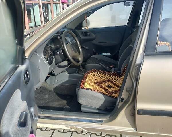 Бежевый Дэу Ланос, объемом двигателя 1.5 л и пробегом 200 тыс. км за 1500 $, фото 3 на Automoto.ua