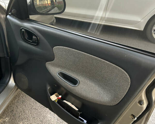 Бежевый Дэу Ланос, объемом двигателя 1.5 л и пробегом 300 тыс. км за 1950 $, фото 9 на Automoto.ua