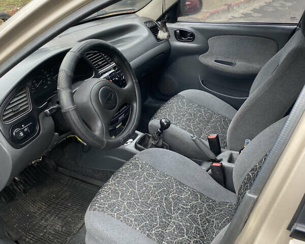 Бежевый Дэу Ланос, объемом двигателя 1.5 л и пробегом 168 тыс. км за 2400 $, фото 4 на Automoto.ua