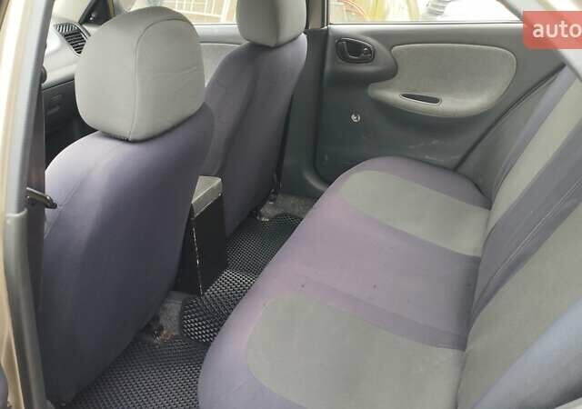 Бежевий Деу Ланос, об'ємом двигуна 1.5 л та пробігом 275 тис. км за 1900 $, фото 10 на Automoto.ua