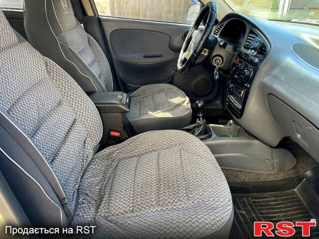 Бежевый Дэу Ланос, объемом двигателя 1.5 л и пробегом 186 тыс. км за 2750 $, фото 11 на Automoto.ua