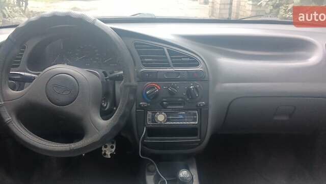 Бежевый Дэу Ланос, объемом двигателя 1.5 л и пробегом 277 тыс. км за 2100 $, фото 6 на Automoto.ua