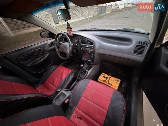 Бежевый Дэу Ланос, объемом двигателя 0 л и пробегом 200 тыс. км за 2000 $, фото 6 на Automoto.ua