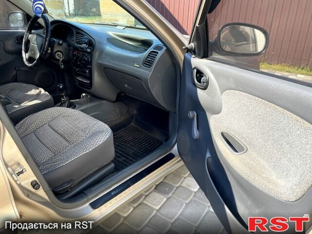 Бежевый Дэу Ланос, объемом двигателя 1.5 л и пробегом 186 тыс. км за 2750 $, фото 10 на Automoto.ua