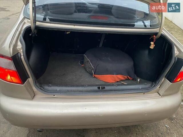 Бежевий Деу Ланос, об'ємом двигуна 1.5 л та пробігом 268 тис. км за 2500 $, фото 15 на Automoto.ua