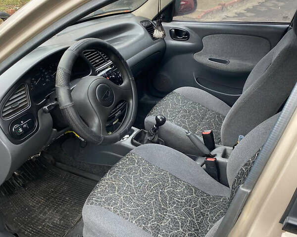 Бежевый Дэу Ланос, объемом двигателя 1.5 л и пробегом 168 тыс. км за 2200 $, фото 5 на Automoto.ua