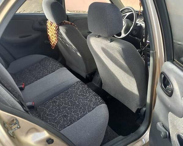 Бежевый Дэу Ланос, объемом двигателя 1.5 л и пробегом 200 тыс. км за 1500 $, фото 4 на Automoto.ua