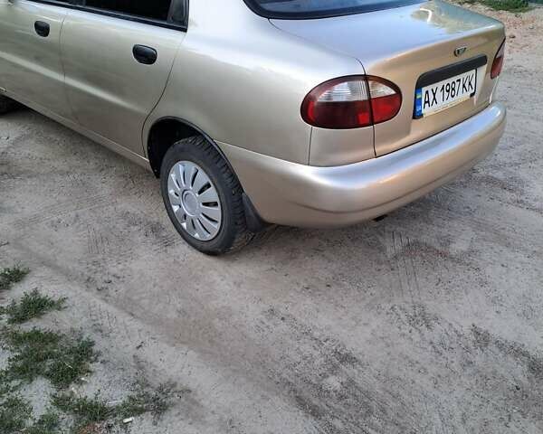 Бежевий Деу Ланос, об'ємом двигуна 1.39 л та пробігом 245 тис. км за 2000 $, фото 3 на Automoto.ua
