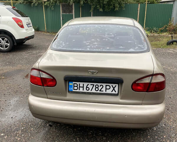 Бежевый Дэу Ланос, объемом двигателя 1.5 л и пробегом 168 тыс. км за 2400 $, фото 3 на Automoto.ua