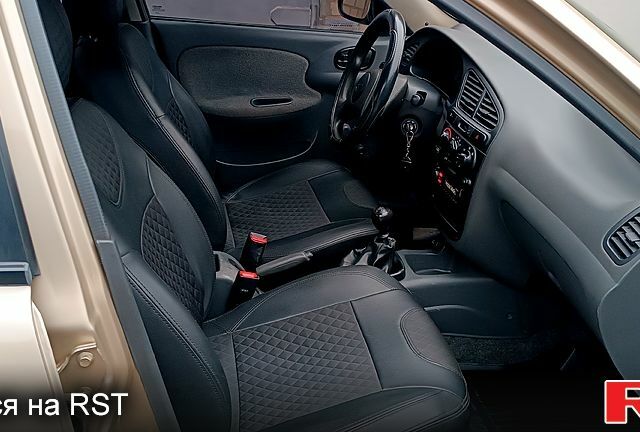 Бежевий Деу Ланос, об'ємом двигуна 1.4 л та пробігом 192 тис. км за 2900 $, фото 10 на Automoto.ua