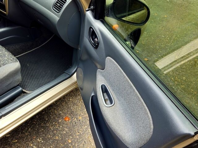 Бежевый Дэу Ланос, объемом двигателя 1.5 л и пробегом 220 тыс. км за 2750 $, фото 11 на Automoto.ua