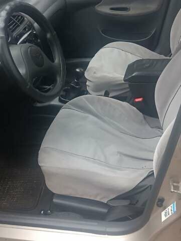 Бежевый Дэу Ланос, объемом двигателя 1.5 л и пробегом 277 тыс. км за 2100 $, фото 7 на Automoto.ua