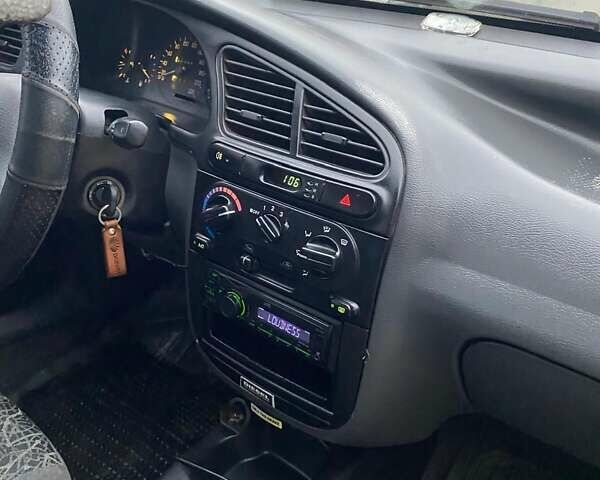 Бежевий Деу Ланос, об'ємом двигуна 1.5 л та пробігом 268 тис. км за 2500 $, фото 10 на Automoto.ua