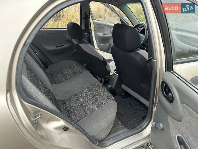 Бежевый Дэу Ланос, объемом двигателя 1.5 л и пробегом 280 тыс. км за 1500 $, фото 14 на Automoto.ua