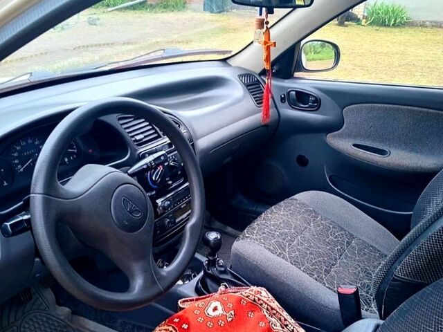 Бежевый Дэу Ланос, объемом двигателя 1.4 л и пробегом 188 тыс. км за 2000 $, фото 3 на Automoto.ua