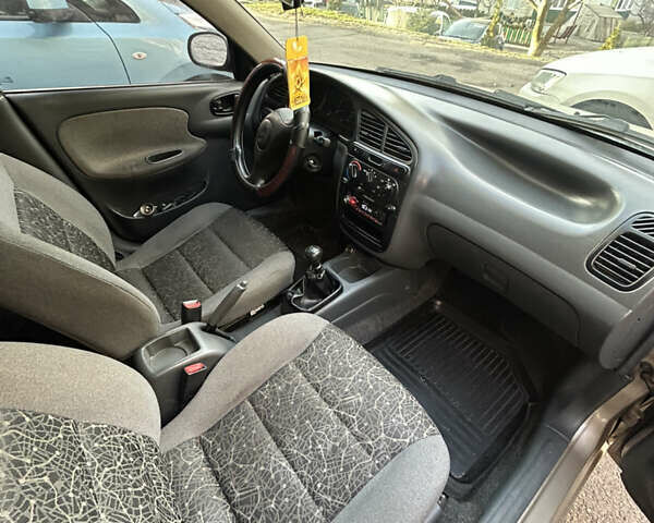 Бежевый Дэу Ланос, объемом двигателя 1.5 л и пробегом 300 тыс. км за 1950 $, фото 6 на Automoto.ua