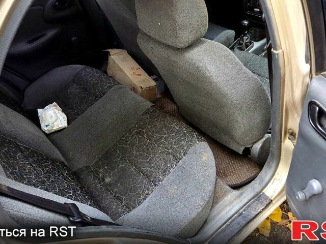 Бежевий Деу Ланос, об'ємом двигуна 1.6 л та пробігом 273 тис. км за 800 $, фото 3 на Automoto.ua