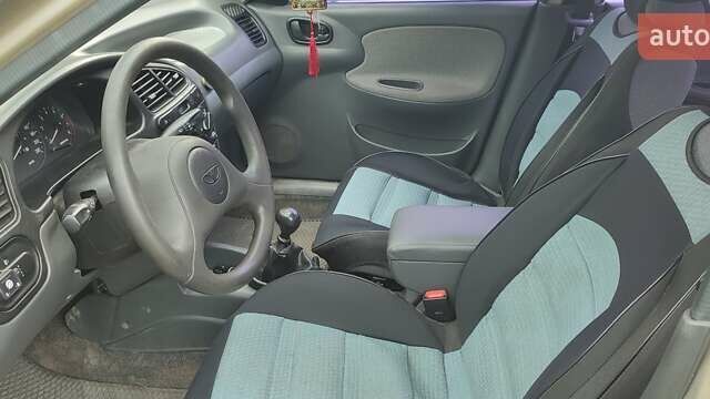 Бежевый Дэу Ланос, объемом двигателя 1.5 л и пробегом 233 тыс. км за 2900 $, фото 5 на Automoto.ua