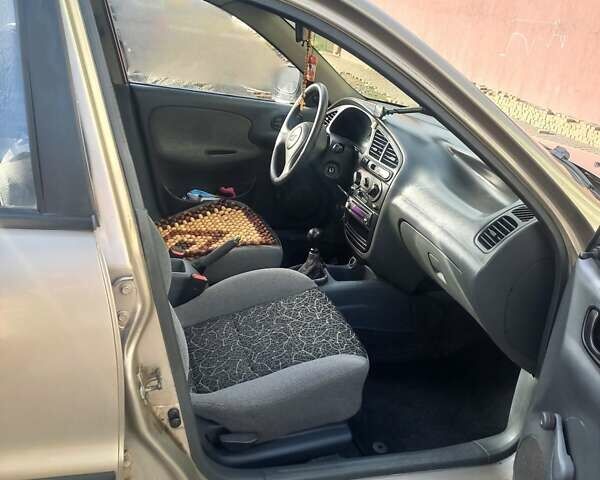 Бежевый Дэу Ланос, объемом двигателя 1.5 л и пробегом 200 тыс. км за 1500 $, фото 6 на Automoto.ua