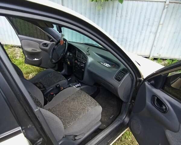 Бежевый Дэу Ланос, объемом двигателя 1.6 л и пробегом 290 тыс. км за 2950 $, фото 4 на Automoto.ua