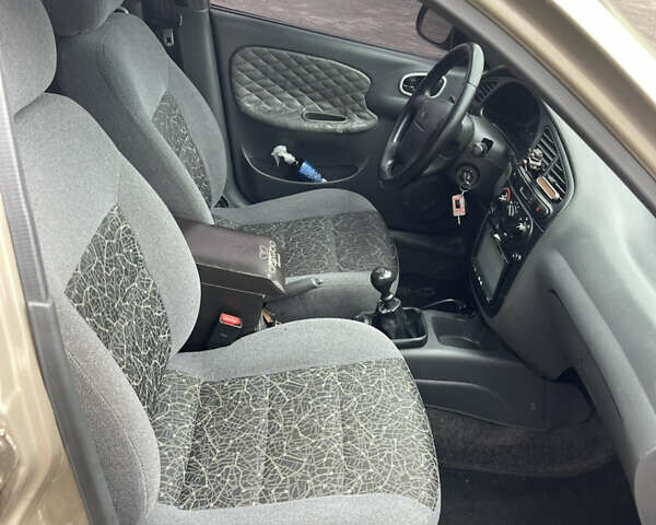 Бежевый Дэу Ланос, объемом двигателя 1.5 л и пробегом 207 тыс. км за 3400 $, фото 13 на Automoto.ua