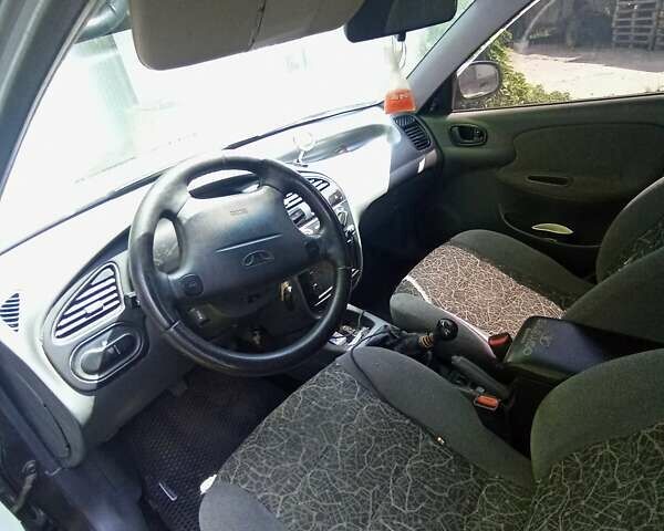 Бежевый Дэу Ланос, объемом двигателя 1.6 л и пробегом 290 тыс. км за 2950 $, фото 6 на Automoto.ua