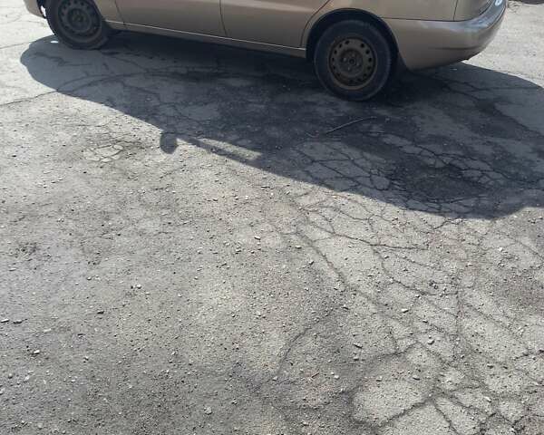 Бежевий Деу Ланос, об'ємом двигуна 1.6 л та пробігом 110 тис. км за 3000 $, фото 4 на Automoto.ua