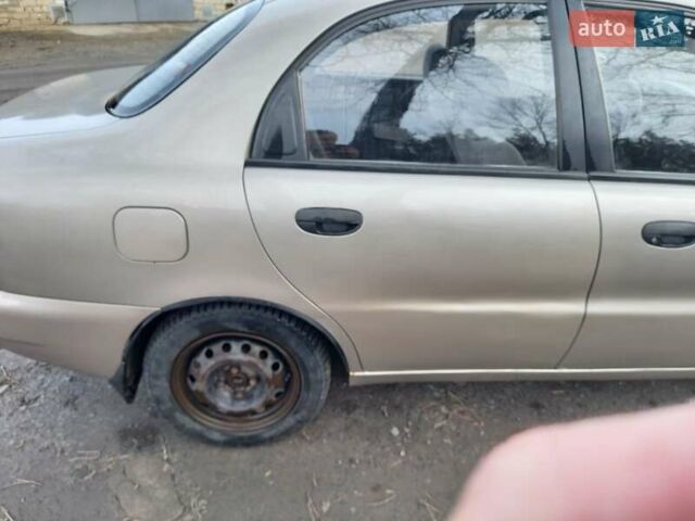 Бежевий Деу Ланос, об'ємом двигуна 1.6 л та пробігом 110 тис. км за 3000 $, фото 5 на Automoto.ua