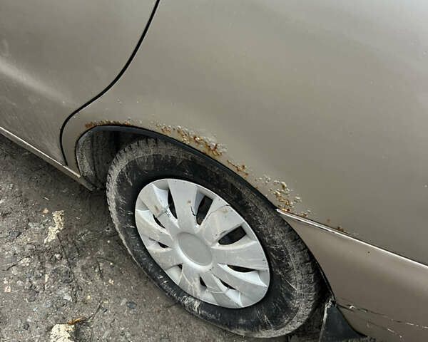 Бежевий Деу Ланос, об'ємом двигуна 1.5 л та пробігом 340 тис. км за 1100 $, фото 4 на Automoto.ua