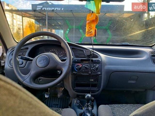 Бежевый Дэу Ланос, объемом двигателя 1.5 л и пробегом 245 тыс. км за 1900 $, фото 6 на Automoto.ua