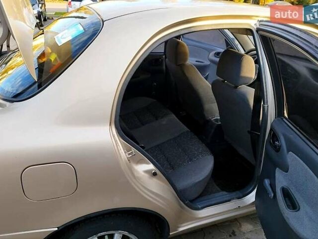 Бежевый Дэу Ланос, объемом двигателя 1.5 л и пробегом 245 тыс. км за 1900 $, фото 8 на Automoto.ua