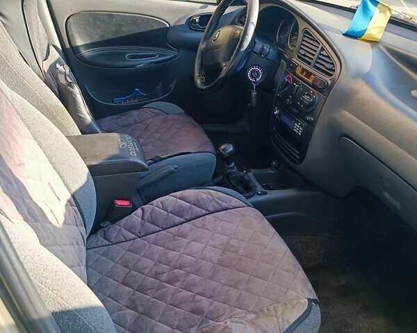 Бежевий Деу Ланос, об'ємом двигуна 1.5 л та пробігом 212 тис. км за 2200 $, фото 3 на Automoto.ua