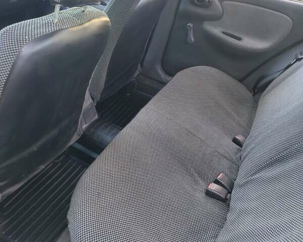 Бежевый Дэу Ланос, объемом двигателя 1.5 л и пробегом 167 тыс. км за 2600 $, фото 5 на Automoto.ua