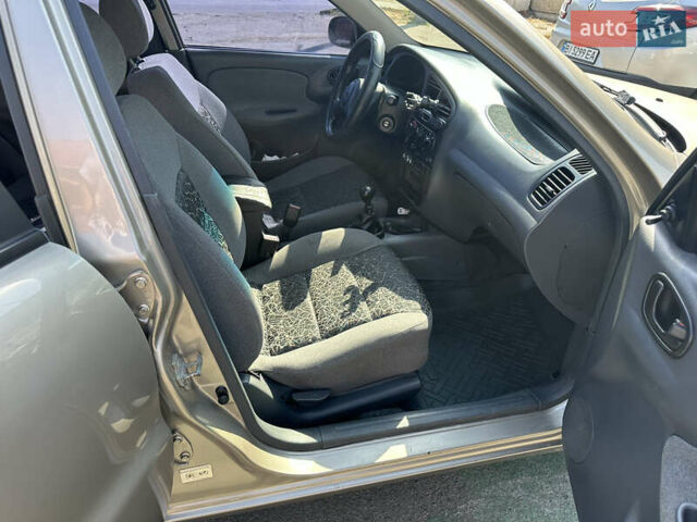 Бежевый Дэу Ланос, объемом двигателя 1.5 л и пробегом 183 тыс. км за 2300 $, фото 6 на Automoto.ua