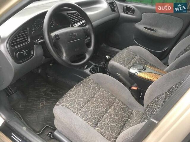 Бежевий Деу Ланос, об'ємом двигуна 1.6 л та пробігом 183 тис. км за 2700 $, фото 4 на Automoto.ua