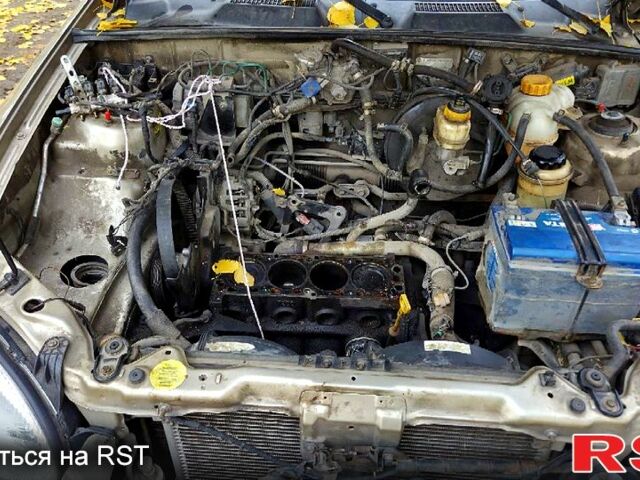 Бежевий Деу Ланос, об'ємом двигуна 1.6 л та пробігом 273 тис. км за 800 $, фото 7 на Automoto.ua