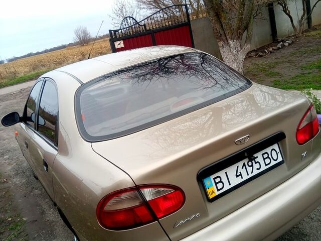 Бежевий Деу Ланос, об'ємом двигуна 1.4 л та пробігом 138 тис. км за 2650 $, фото 4 на Automoto.ua