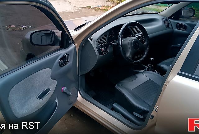 Бежевий Деу Ланос, об'ємом двигуна 1.4 л та пробігом 192 тис. км за 2900 $, фото 11 на Automoto.ua