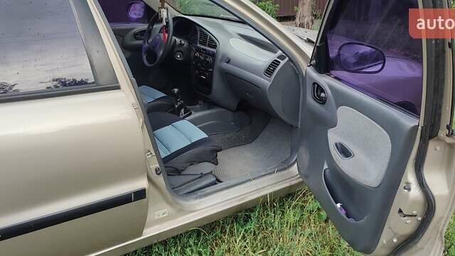 Бежевый Дэу Ланос, объемом двигателя 1.5 л и пробегом 233 тыс. км за 2900 $, фото 6 на Automoto.ua