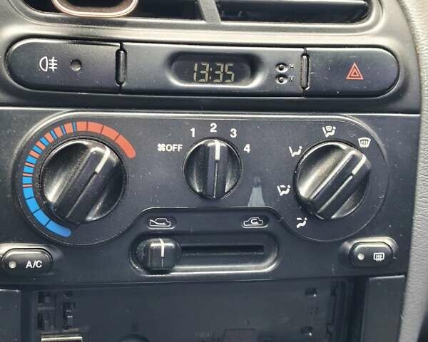 Бежевий Деу Ланос, об'ємом двигуна 1.5 л та пробігом 130 тис. км за 2450 $, фото 12 на Automoto.ua