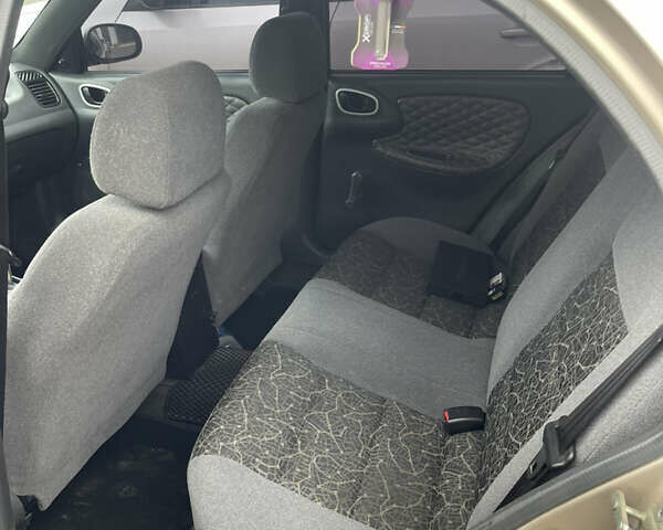 Бежевый Дэу Ланос, объемом двигателя 1.5 л и пробегом 207 тыс. км за 3400 $, фото 7 на Automoto.ua