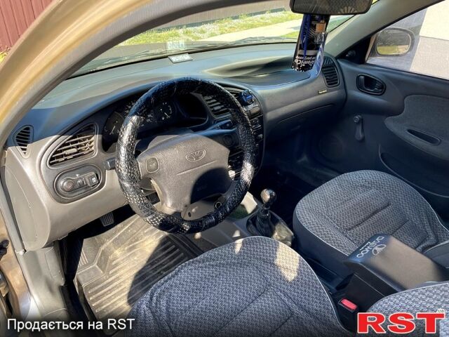 Бежевый Дэу Ланос, объемом двигателя 1.5 л и пробегом 186 тыс. км за 2750 $, фото 9 на Automoto.ua