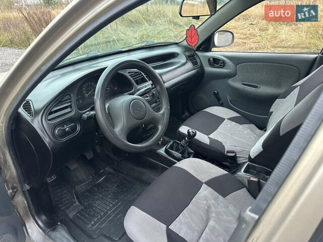 Бежевый Дэу Ланос, объемом двигателя 1.5 л и пробегом 280 тыс. км за 1500 $, фото 17 на Automoto.ua