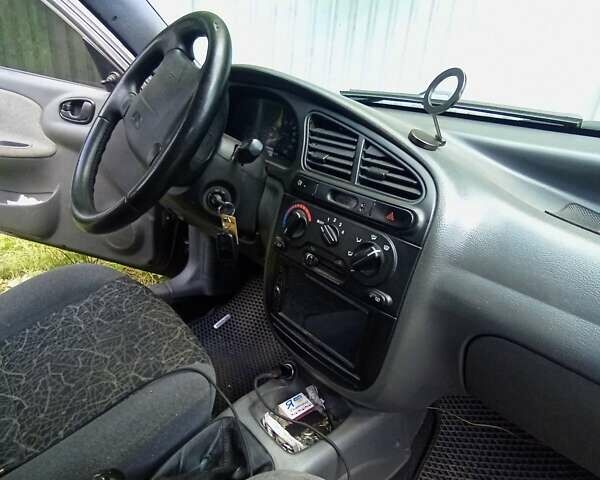 Бежевый Дэу Ланос, объемом двигателя 1.6 л и пробегом 290 тыс. км за 2950 $, фото 3 на Automoto.ua