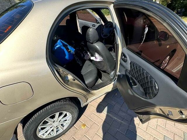 Бежевий Деу Ланос, об'ємом двигуна 1.5 л та пробігом 150 тис. км за 2550 $, фото 3 на Automoto.ua